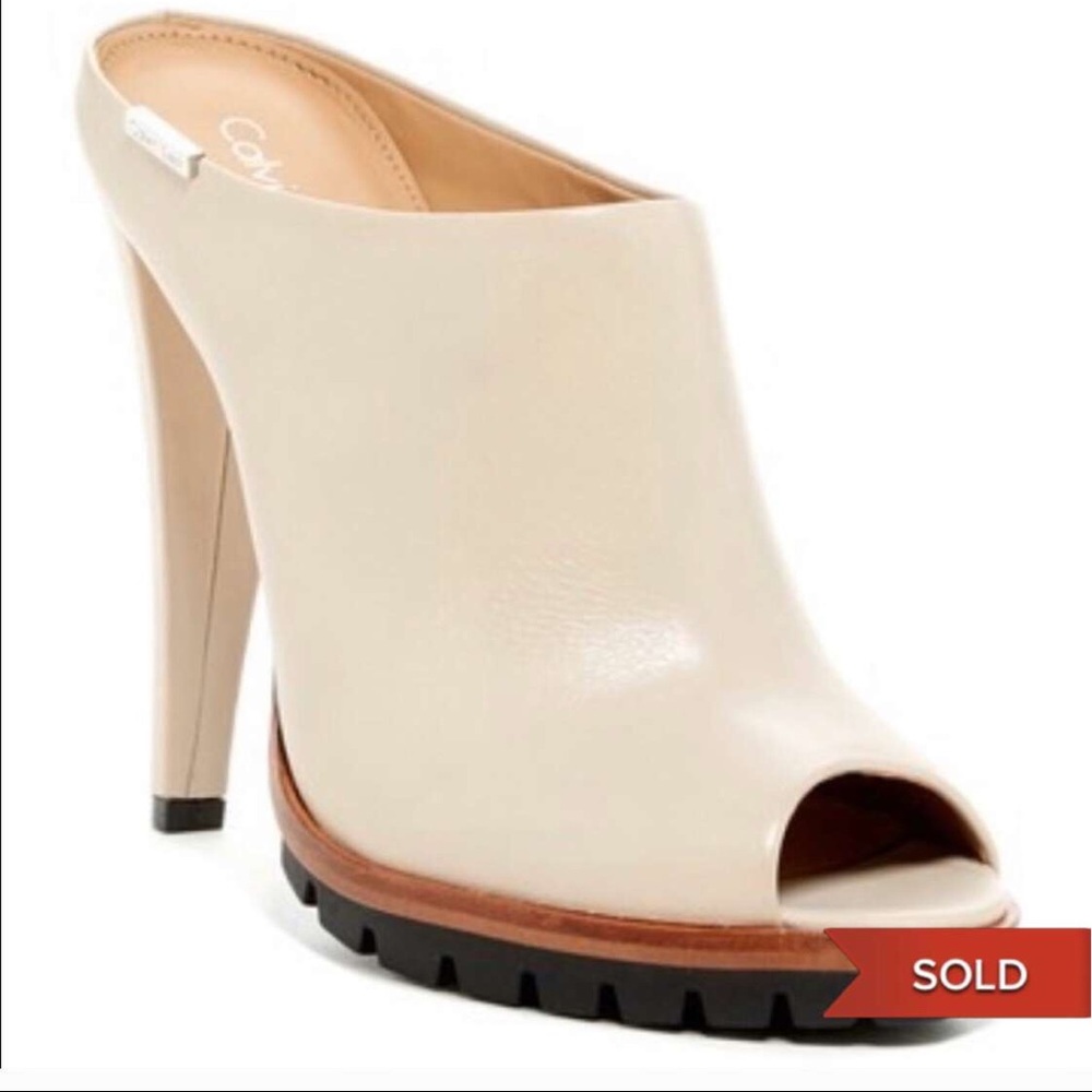 SOLD ELSEWHERE Calvin Klein slides heels 10M